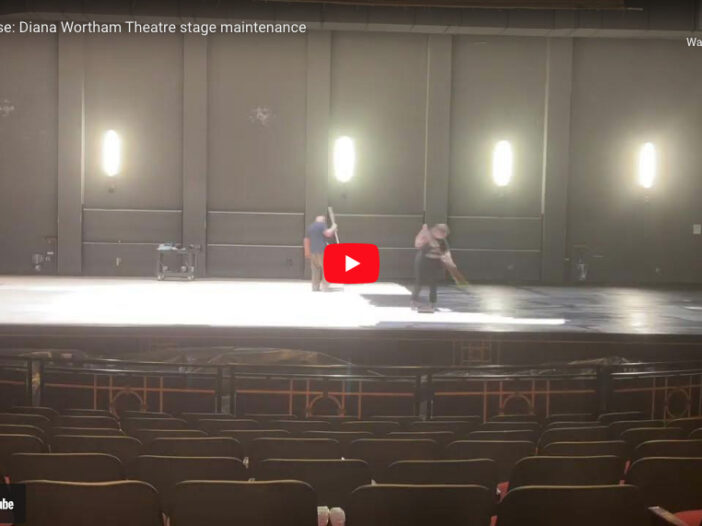 Time lapse video thumb of Diana Wortham Theatre stage being sanded and painted.