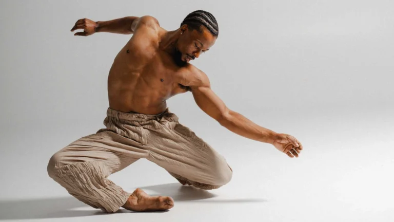 Studio photo of a dancer elegantly posed.