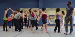 Photo: Dancers in a masterclass led by a Pilobolus Dancer