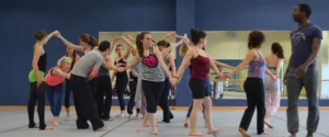 Photo: Dancers in a masterclass led by a Pilobolus Dancer
