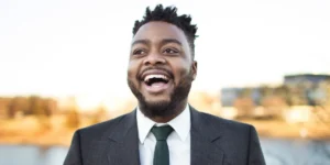 Photo: headshot of Reginald Golden smiling