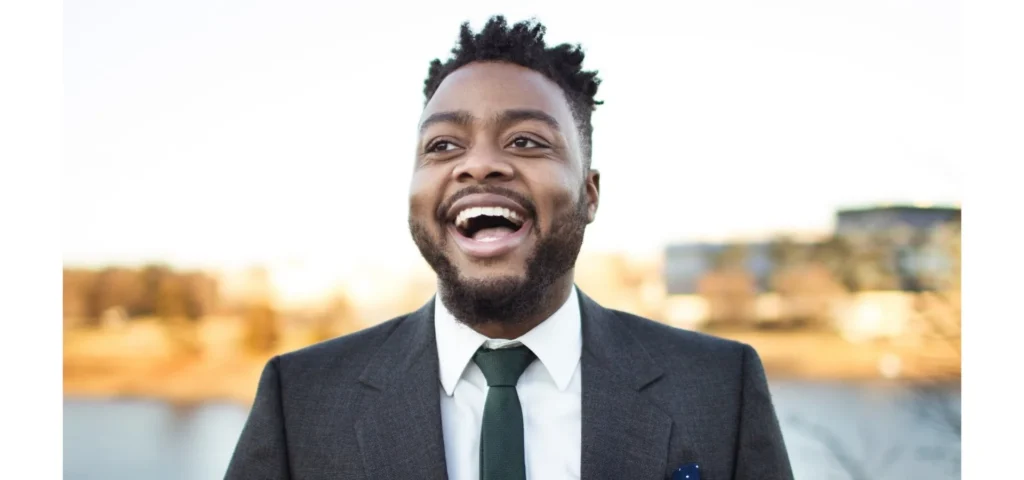 Photo: headshot of Reginald Golden smiling