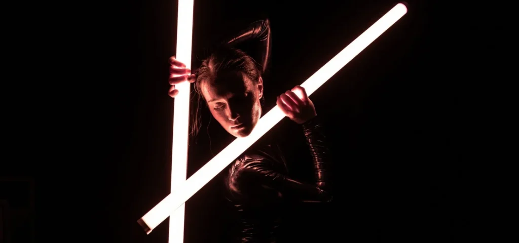 Photo: New Dialect dancer posed with long LED tube lights